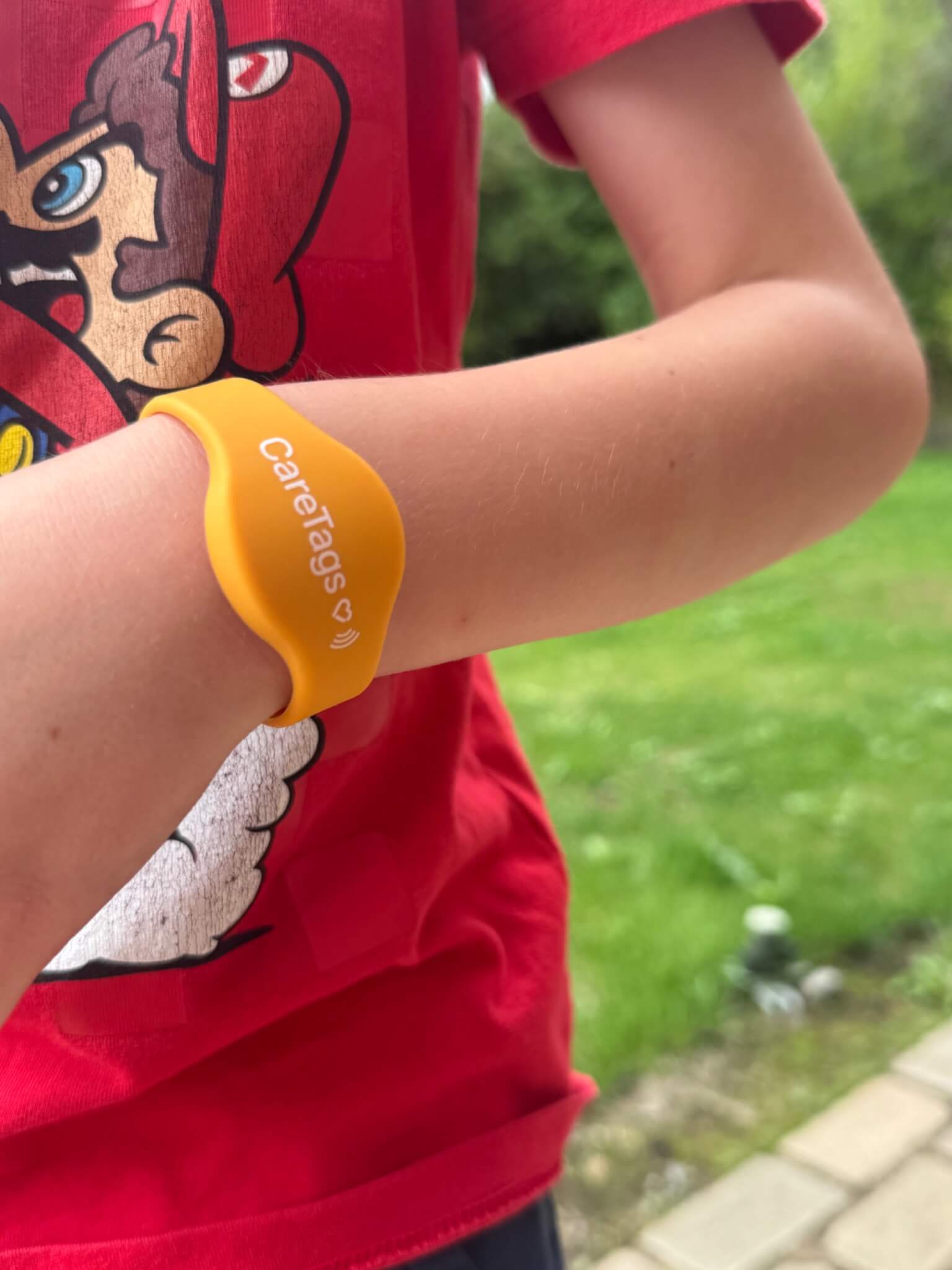 Child wearing a CareTag wristband